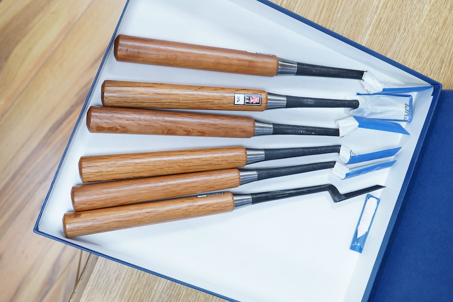 Four sets of Japanese chisels, including a set of six Kote Nomi cranked neck trowel chisels, a set of seven mortise chisels, and two other cabinetmakers sets (22 in total), plus two Japanese hammers/mallets